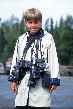 Boy with Cameras